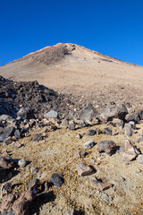 View of top of Teide mountain against the blue sky background, Tenerife, Canary Islands, Spain.