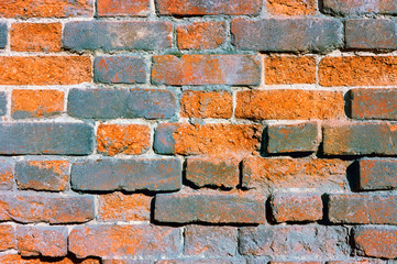 Close-up texture of the old red brick wall. Abstract background.