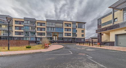 New modern residential buildings with lit windows