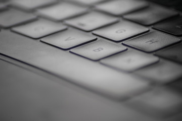 Close-up of backlit Laptop keyboard 