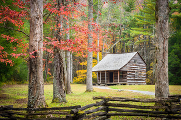 Autumn at an historic cabin in Cades Cove, Great Smoky Mountains National Park, Tennessee.