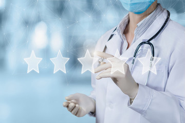 Doctor puts a rating on a virtual screen.