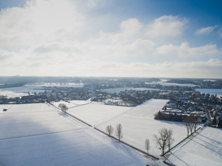Aerial shot a town in Germany covered in snow
