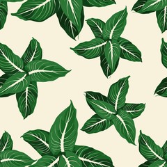 Tropical jungle plants, exotic leaves on yellow background. Beach seamless pattern.