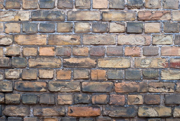 yellow-brown brick wall, background