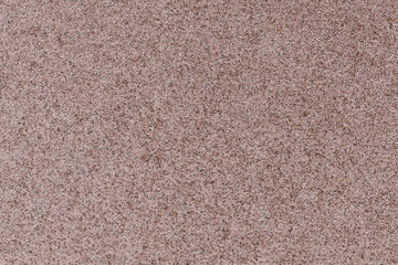 Granular abstract uniform grainy surface. Rough texture background.