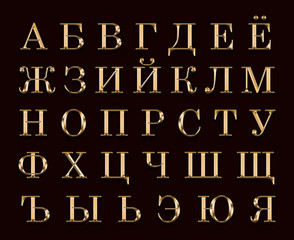 Golden English alphabet on a black background.