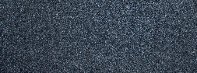 Granular abstract uniform grainy surface. Rough texture background.