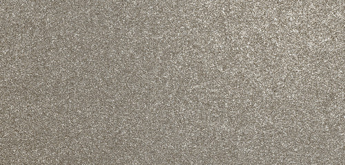 Granular abstract uniform grainy surface. Rough texture background.