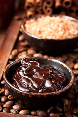 Chocolate body skin treatment on wooden background