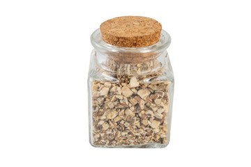 dandelion root or in latin Taraxaci radix in a glass jar isolated on white background. medicinal healing herbs. herbal medicine. alternative medicine