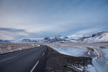Road through beautiful winter landscape in Iceland 