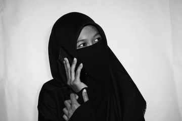 Close up view of Pretty lady woman girl wear hijab jilbab niqab kerudung niqaab scarf cover face...