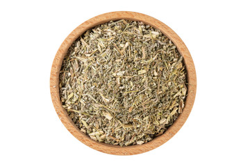 wormwood herb or in latin Absinthii herba herb in wooden bowl isolated on white background....