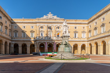 Town Hall in Giacomo Leopardi Square with the monument dedicated to the poet, Recanati Town, Italy