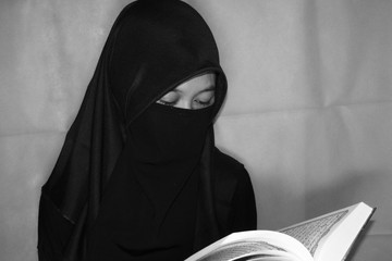Close up view of Pretty lady woman girl wear hijab jilbab niqab kerudung niqaab scarf cover face...