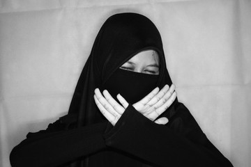 Close up view of Pretty lady woman girl wear hijab jilbab niqab kerudung niqaab scarf cover face...