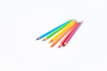 Set of colored pencils on a white background. Color pencils isolated on white background. Copy space by color pencils.