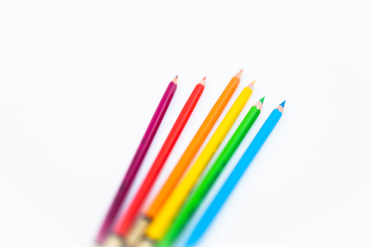 Set of colored pencils on a white background. Color pencils isolated on white background. Copy space by color pencils.