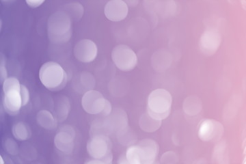 Abstract gradient purple bokeh background.