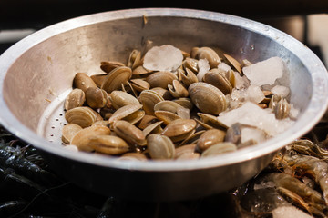 Fresh mussels are sold on the street market