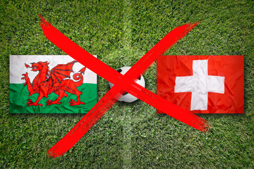 Canceled soccer game, Wales vs. Switzerland flags on soccer field