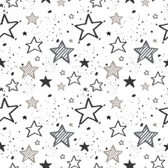 Obraz premium Seamless pattern of stars randomly arranged.
