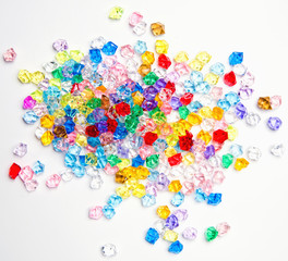 Multicolored gemstones on a white background