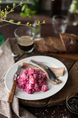 Homemade Beet and Potato Salad Served with Salted Herring Fillet