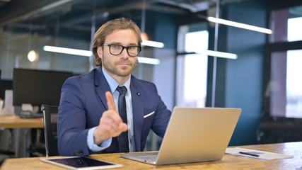 No by Disappointed Businessman at Work, Gesture by Finger