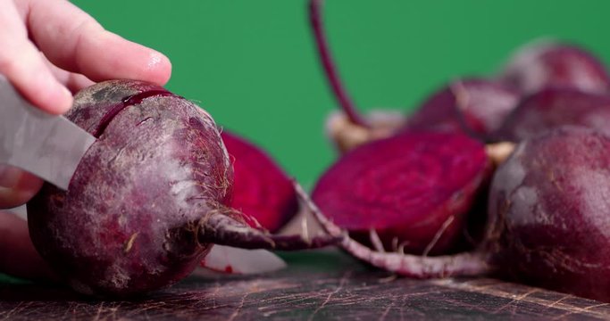Sliced fresh beets on a cutting Board.