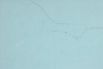 Old blue wall with cracks for background or texture horizontal.