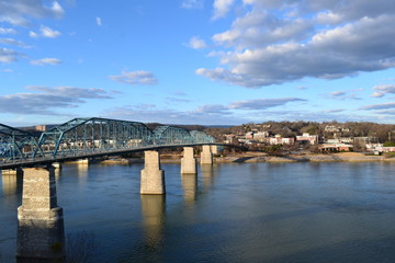 Great View Of The Walnut Street Bridge In Chattanooga, Tennessee On A Sunny Day With Clouds In Sky