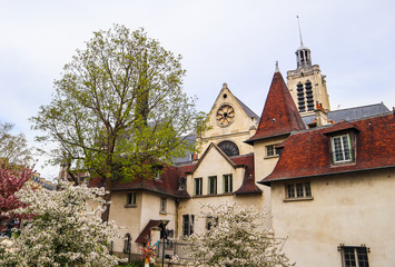 Fototapeta na wymiar Square Saint-Laurent Church in Paris France with blossom trees in spring 2019
