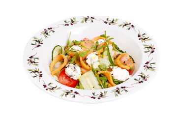 Salmon salad with green leaves, cucumber and tomato on white background