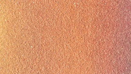 Surface of orange wallpaper in cream cheese style