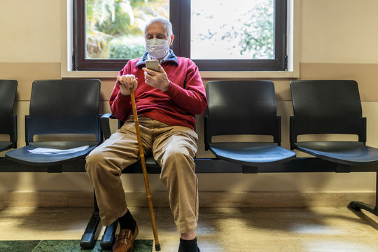 elderly man in a hospital with respirator