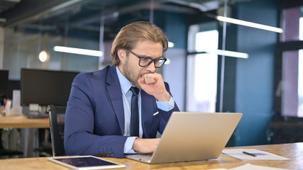 Shocked Businessman Wondering in Awe at Work