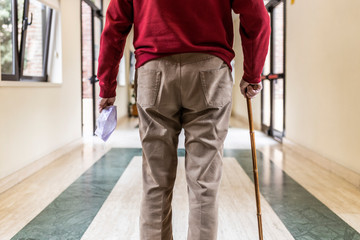 elderly man in a hospital with respirator