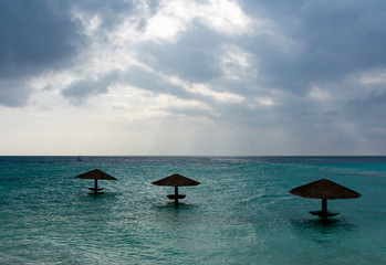 North Malé Atoll, Maldives - December 29 2019 - Umbrellas on the water