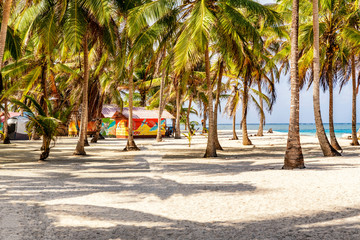 Beautiful unspoiled Caribbean island with huts in San Blas island at politically autonomous Guna...