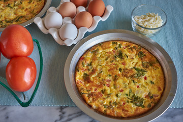 Meal Preparation with freshly made Queche from fresh eggs and farm grown organic vegetables