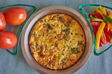 Meal Preparation with freshly made Queche from fresh eggs and farm grown organic vegetables