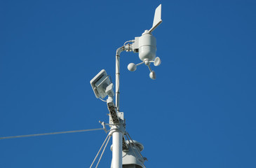 Amateur weather station against the sky