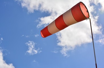 Wind indicator on sky background