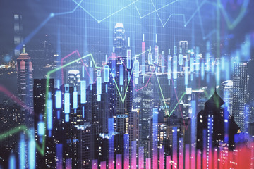 Obraz premium Double exposure of forex chart drawings over cityscape background. Concept of success.