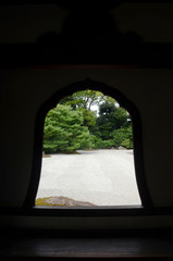 Beautiful bell shape window frame in a kyoto temple.