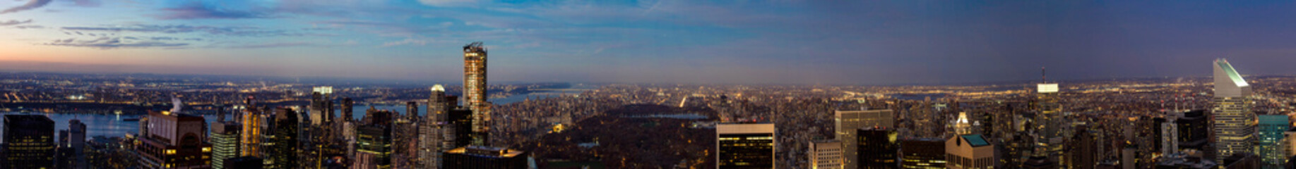New York city skyscrapers and Central park large panoramic view at sunset