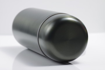 metallic black insulated tumbler on a white isolated background