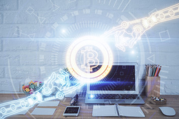 Multi exposure of blockchain and crypto economy theme hologram and table with computer background....